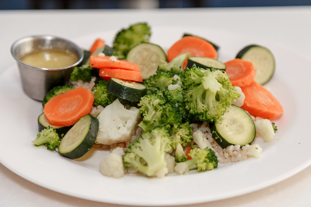 Restaurant kitchen with professional cooking and food preparation