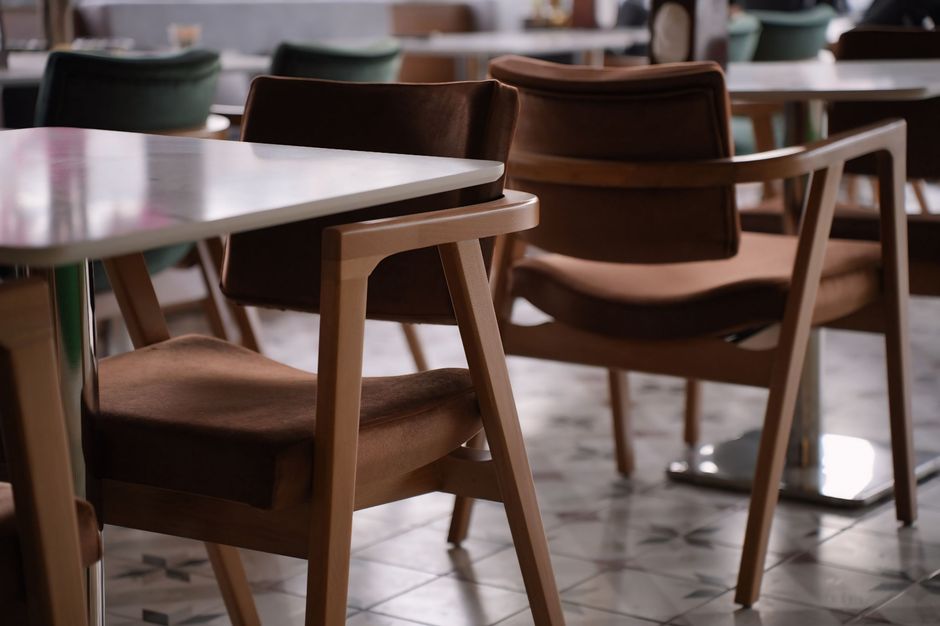 Casual deli interior with counter seating
